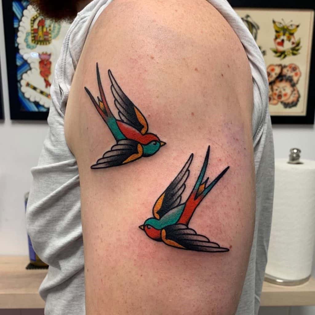 Bicep Swallow Tattoo