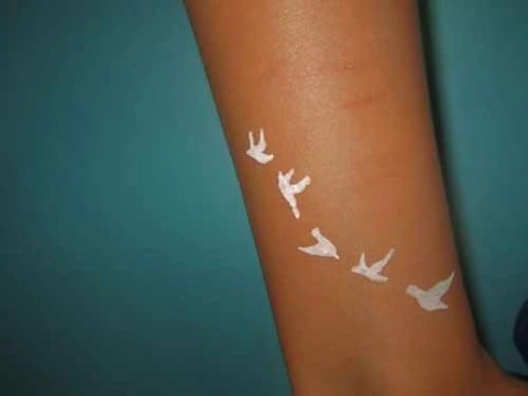 White Ink Tattoos On Dark Skin, saved tattoo, Birds 1