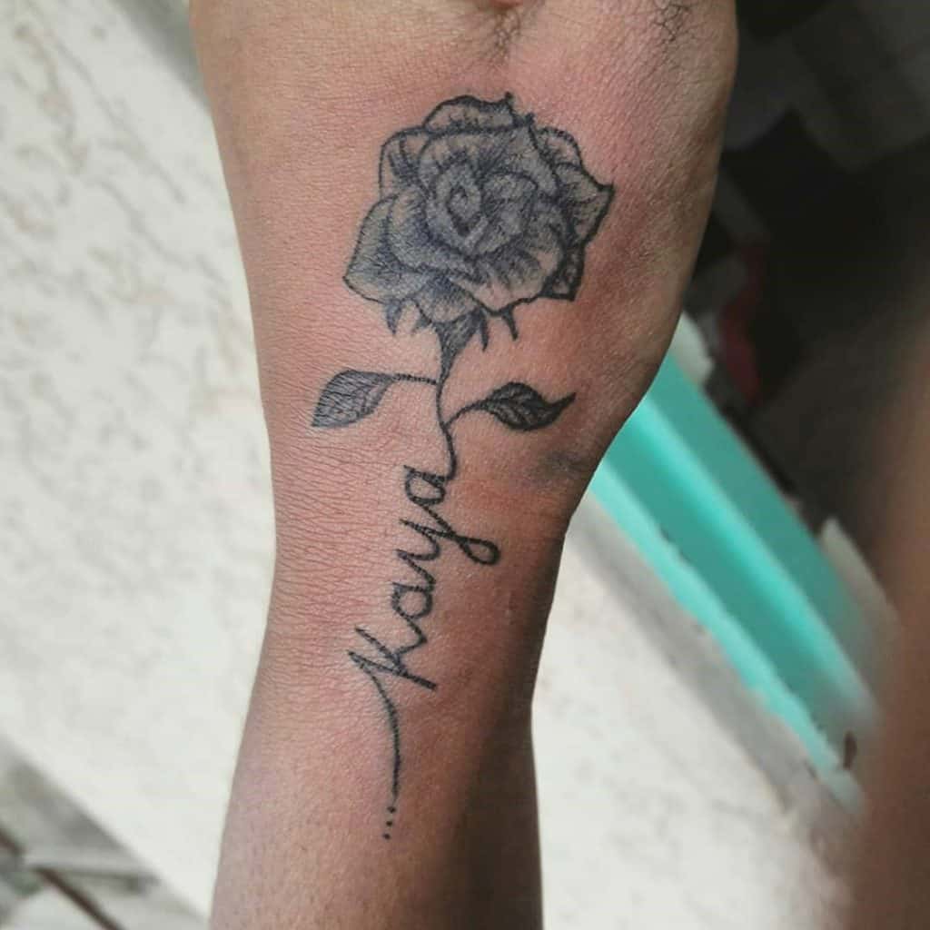 Black Rose Tattoo With Name On Hand