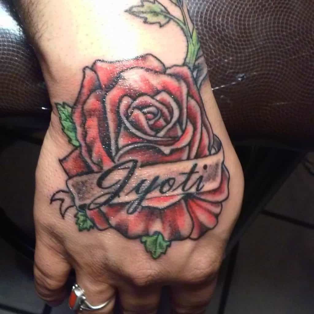 Fist Red Rose Tattoo With Name Ink