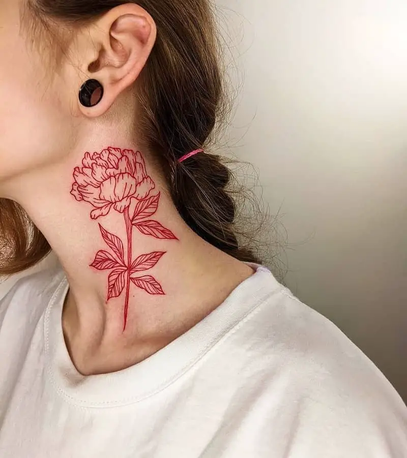 Red tattoo on the neck of women