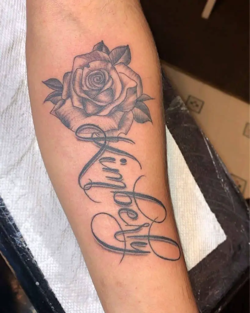 Rose Tattoo With Name Inside Design