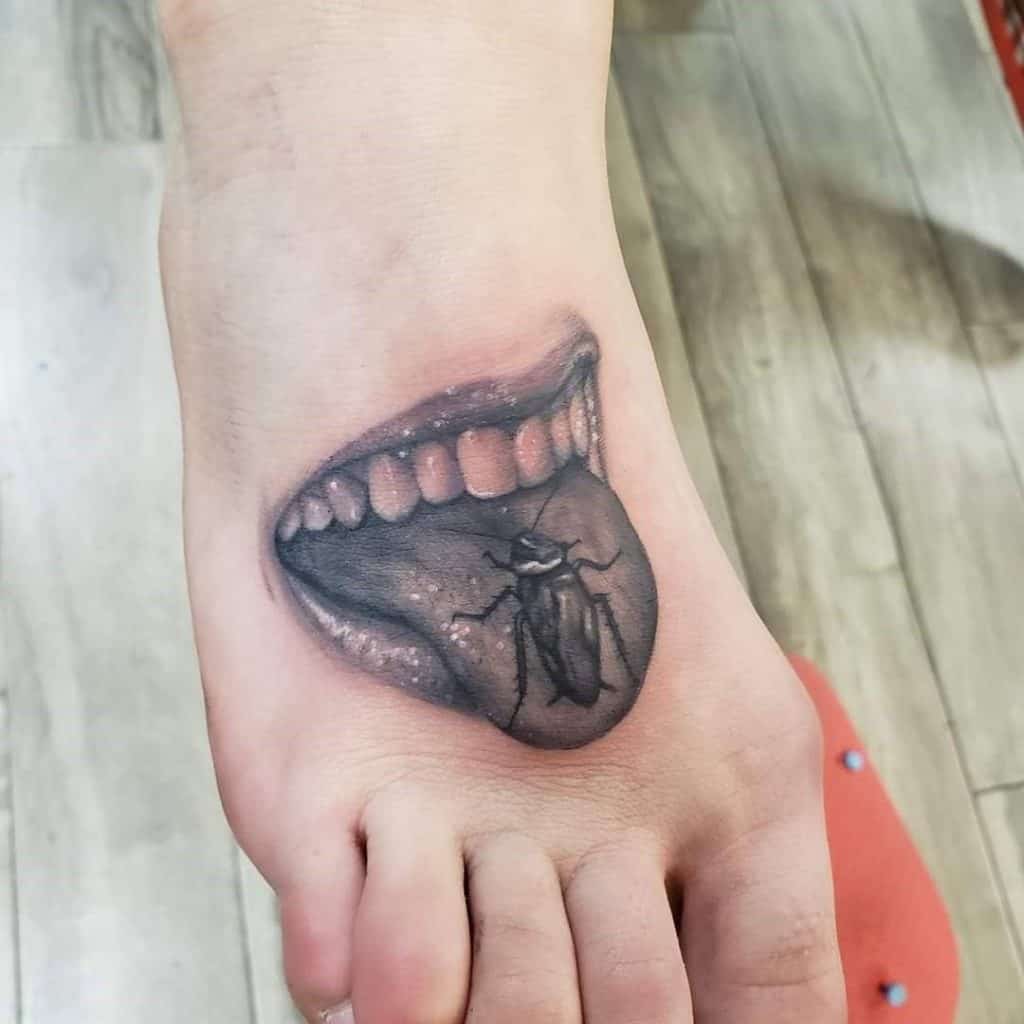 Black & Scary Bug Inspired Foot Tattoo 