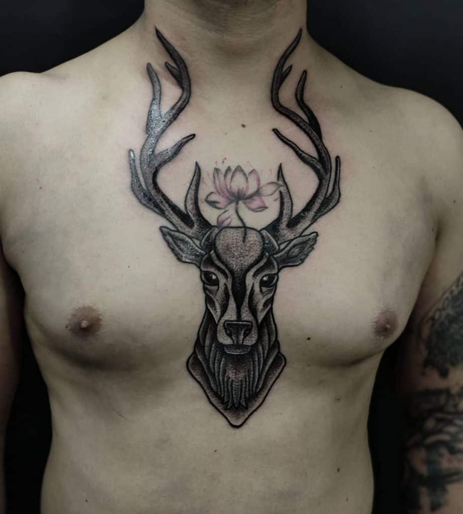 Deer Head Tattoo on The chest area 