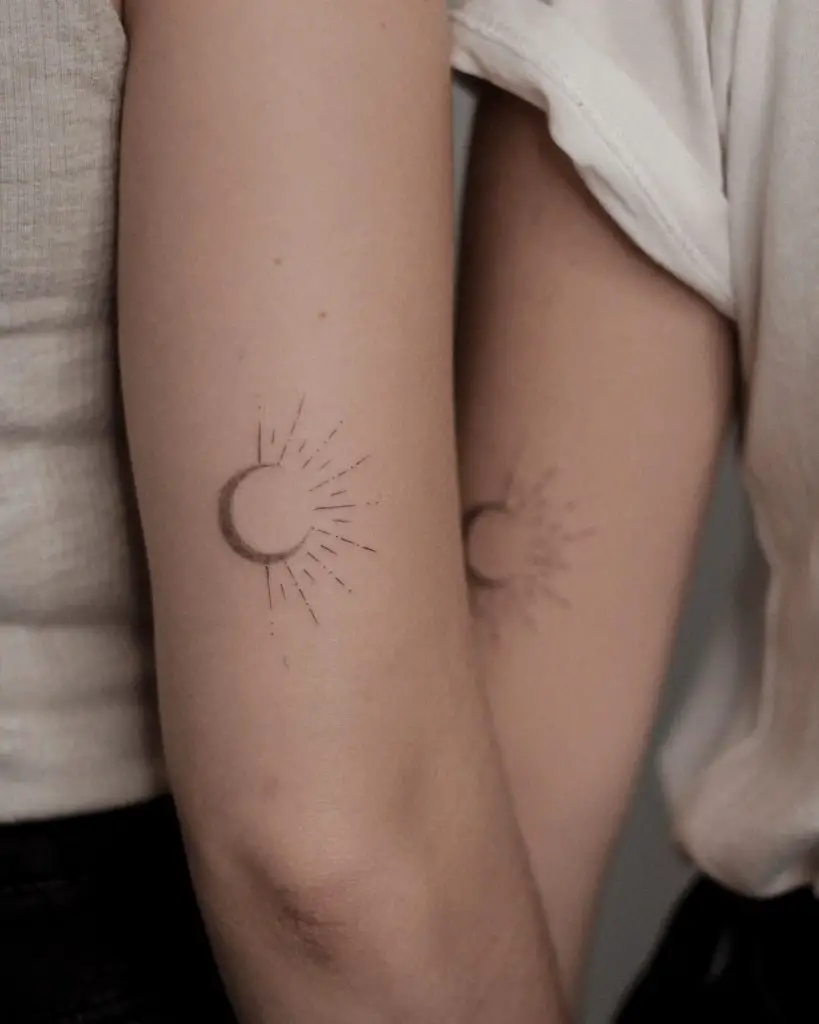 Minimalist sunrise tattoo on the arm - Tattoogrid.net