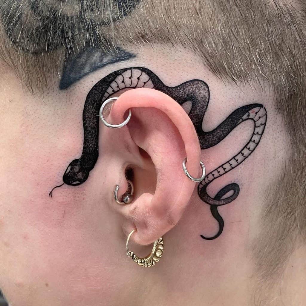 Scary Black Ink Snake Small Behind The Ear Tattoo 