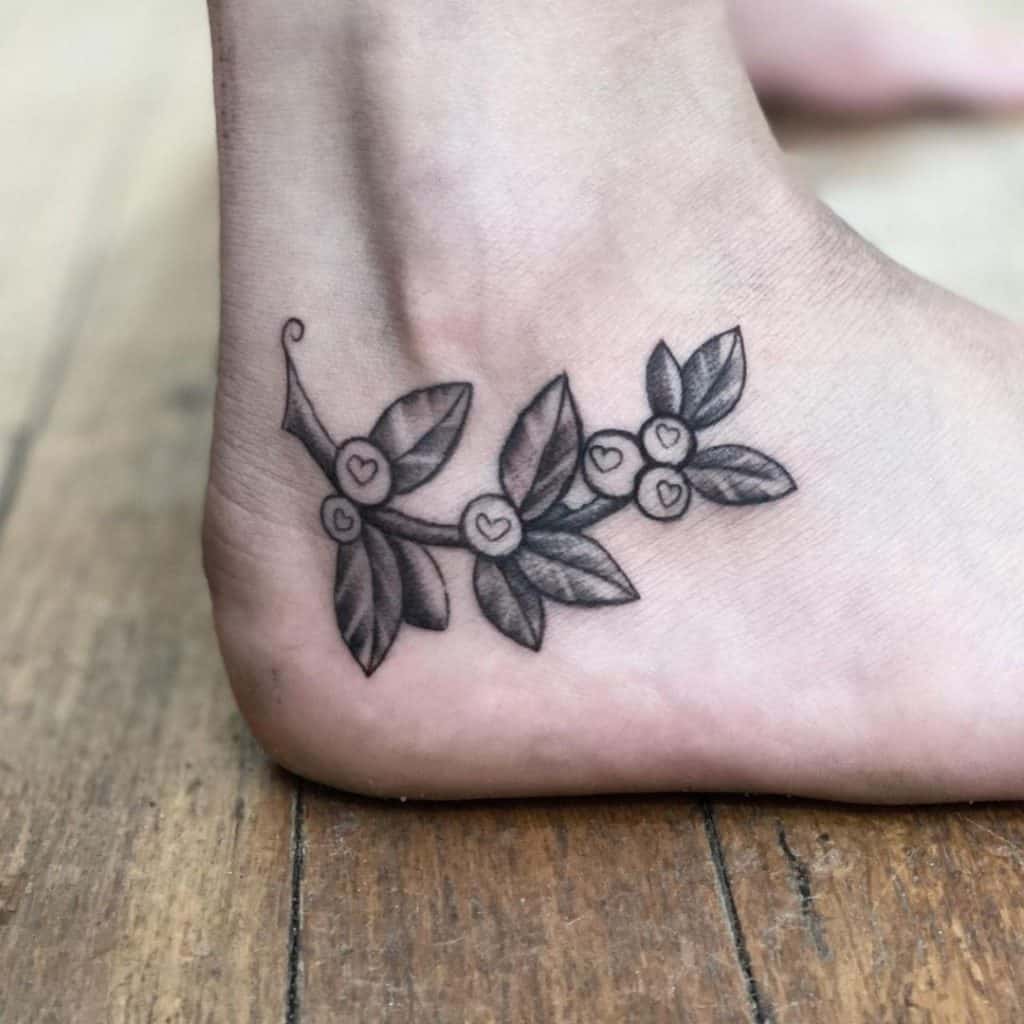 Small Leaf Inspired Foot Tattoo 