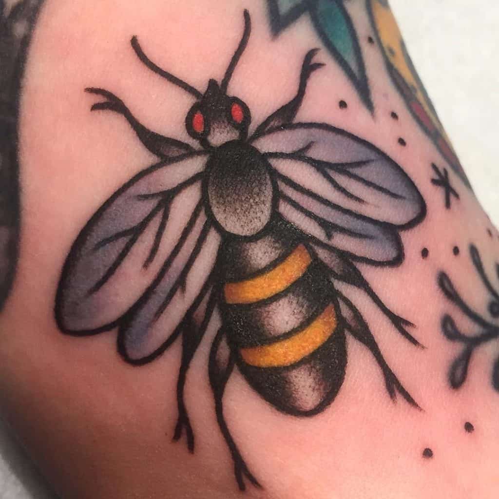 Traditional bee tattoo 3