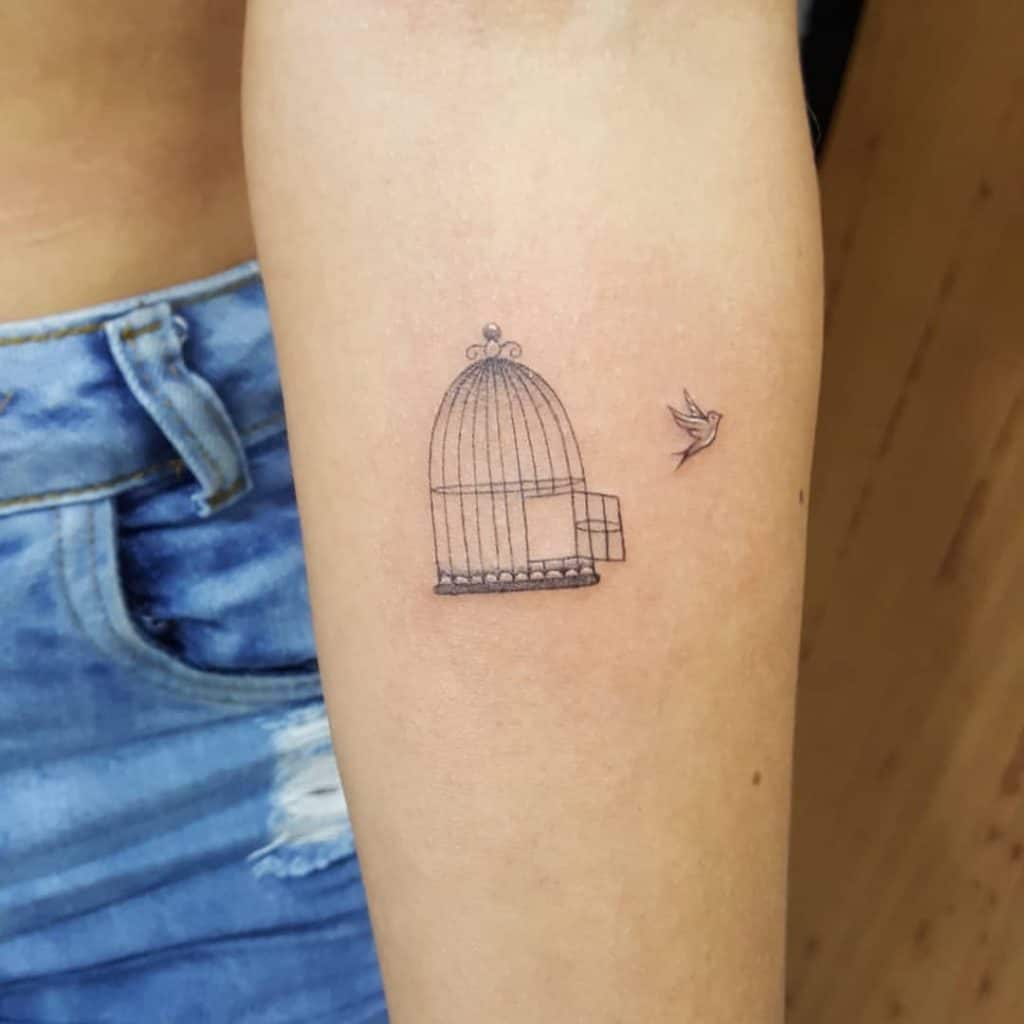 An Open Cage Tattoo 1
