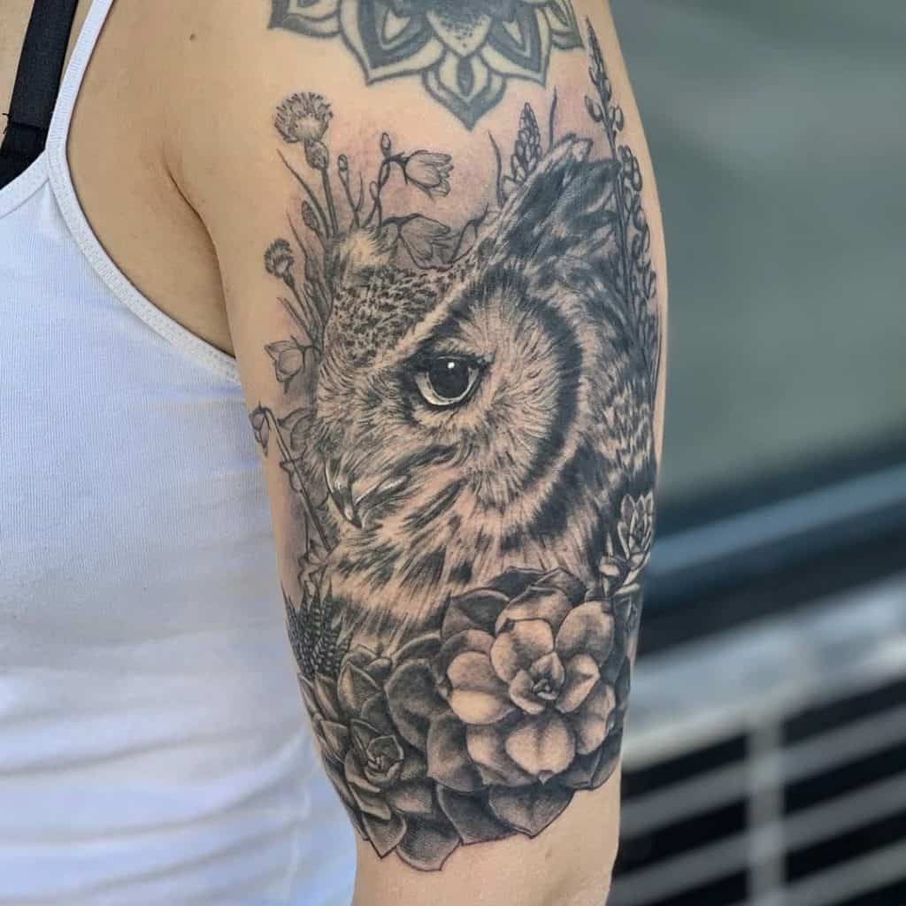 Animal eyes and flower tattoos