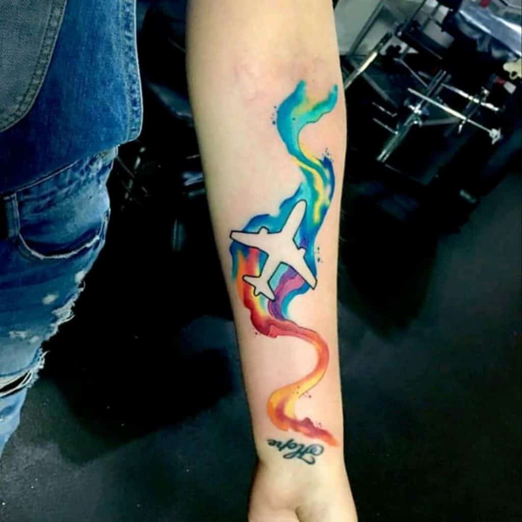 Artsy & Colorful Airplane Tattoo On Arm