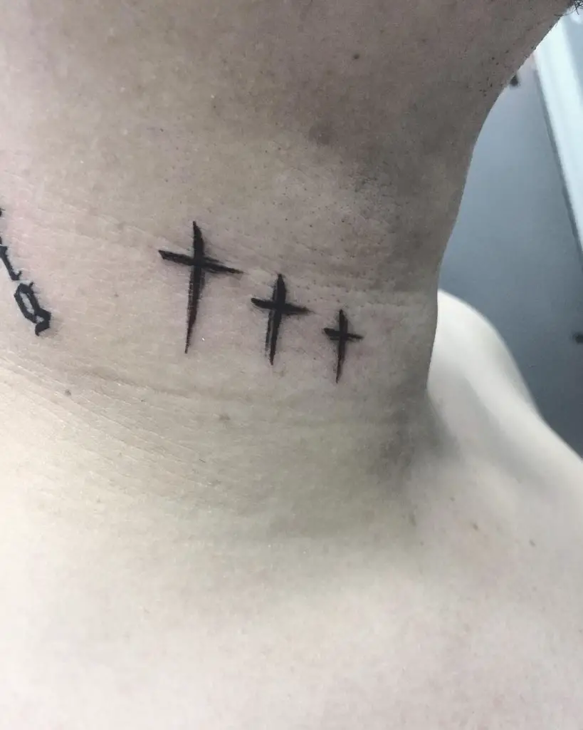 Cross neck tattoo 3
