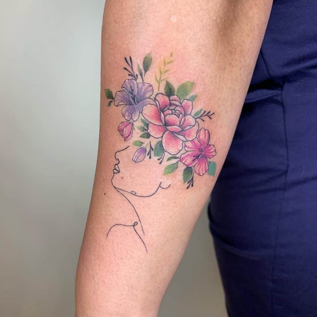 Crown and Flowers Tattoo on Arm