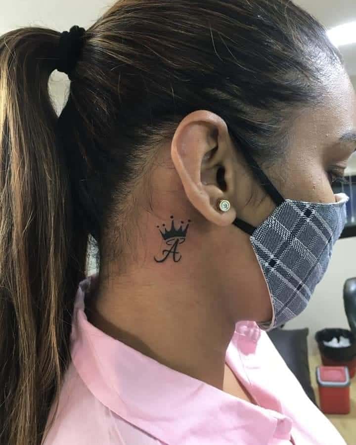 Women Crown neck tattoo 1