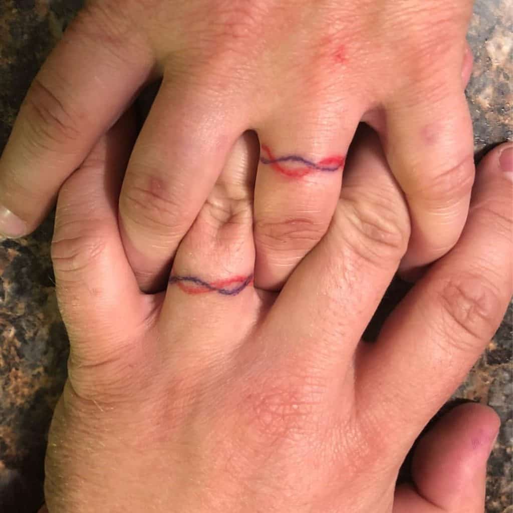 Infinity Traditional Wedding Ring Tattoo 3