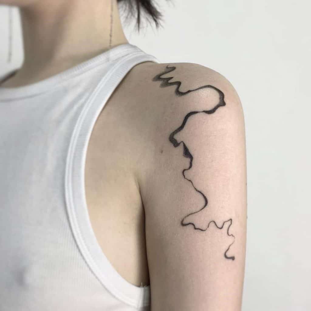 Map Of The World Inspired Shoulder Tattoo 