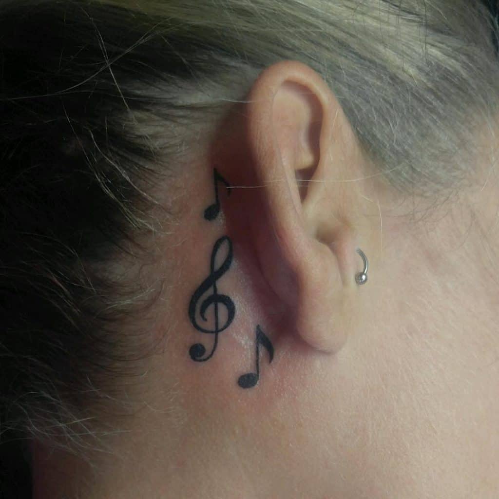 Music notes neck tattoo 2