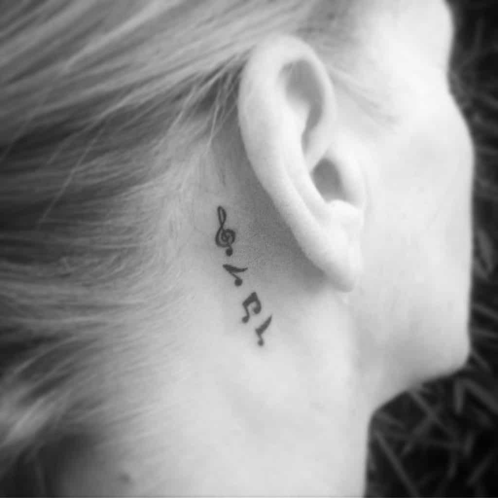 Music notes neck tattoo 3