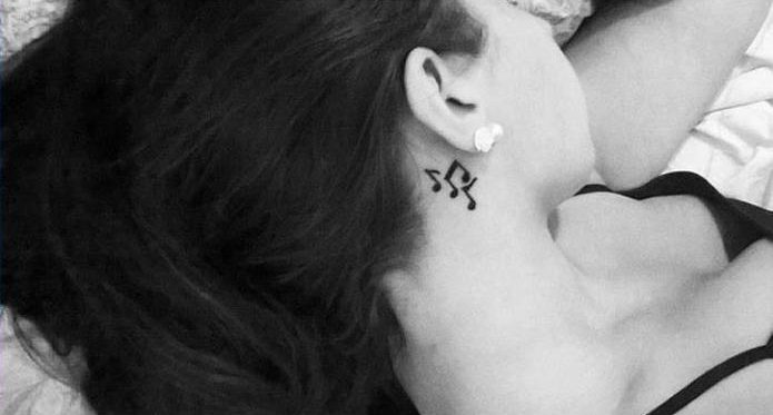 Music notes neck tattoo 5