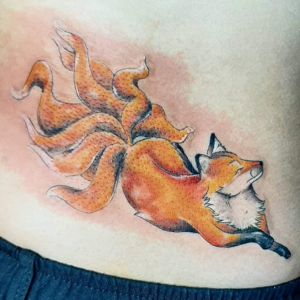 Fox Tattoos: Meaning, Symbolism, and Best Design Ideas for 2024 13 1Nine-Tail Fox Tattoo