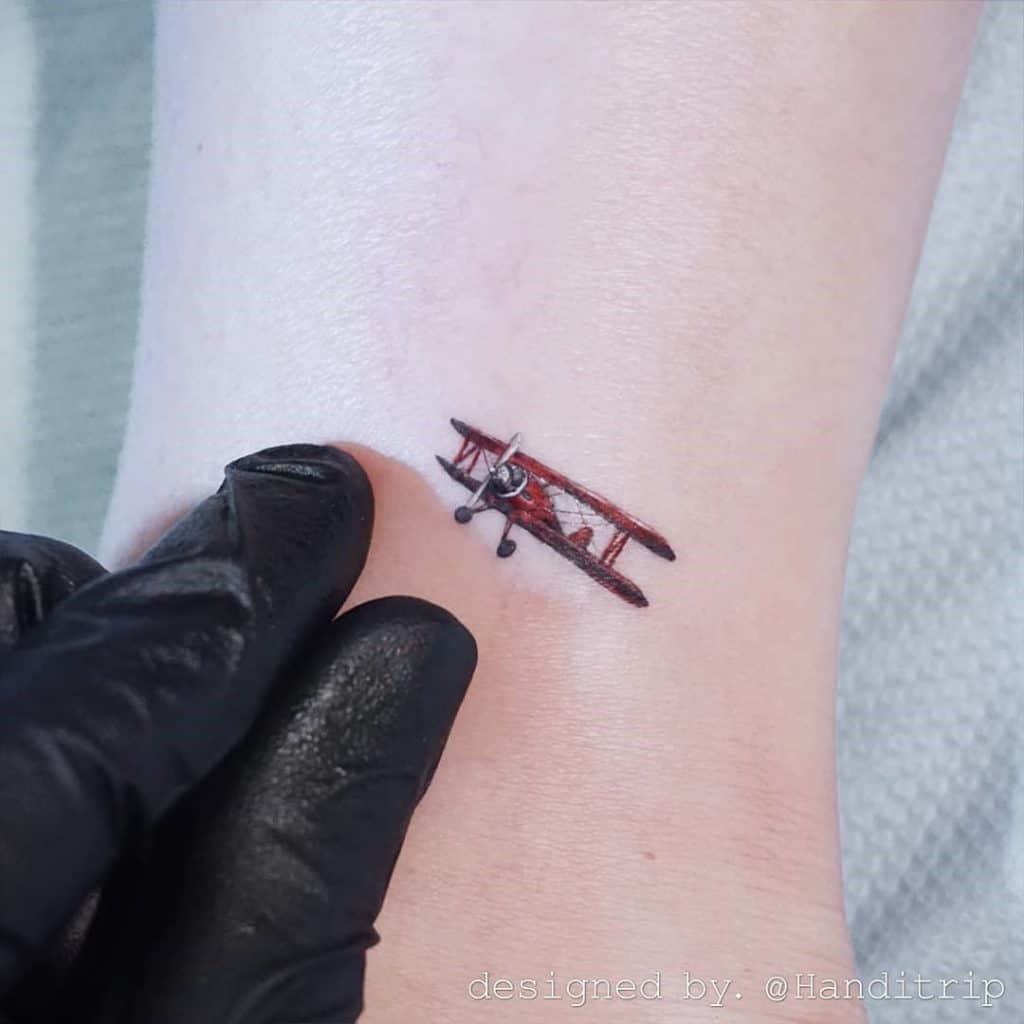 Simple Airplane Tattoo Red Ink