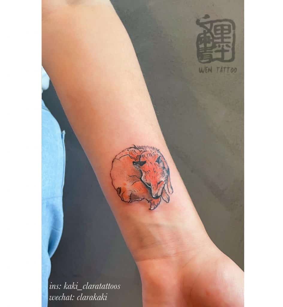 Fox Tattoos: Meaning, Symbolism, and Best Design Ideas for 2024 23 The Curled Fox Tattoo 4