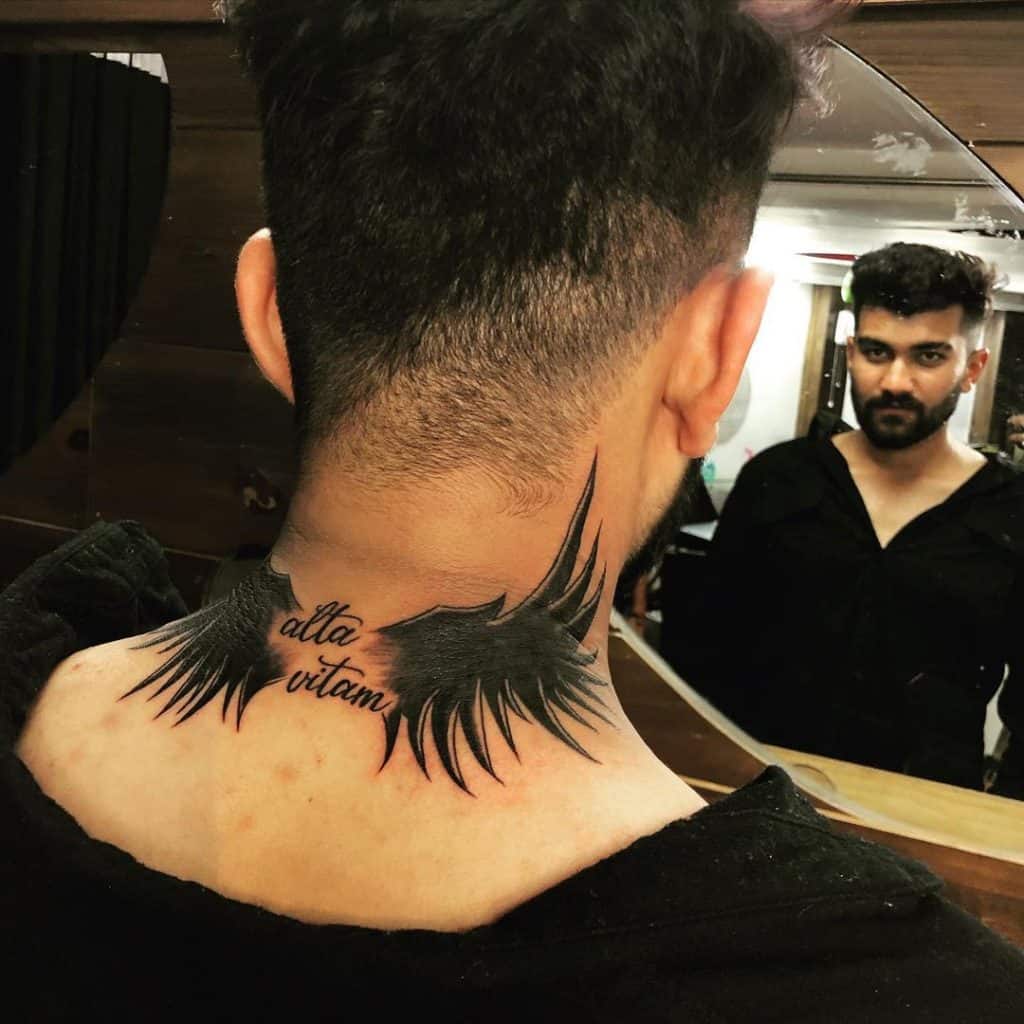 Wing neck tattoo 5