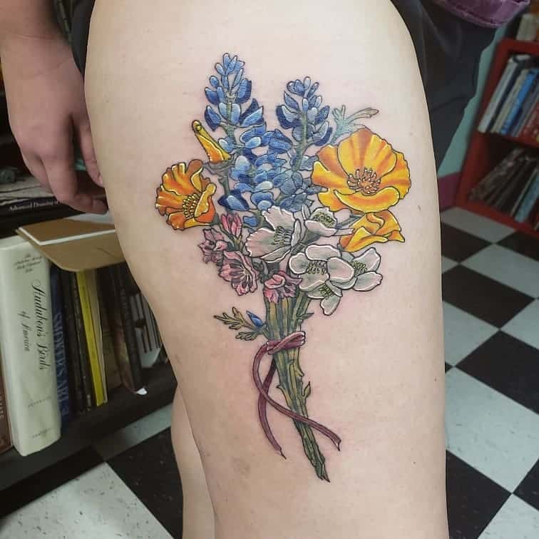 thigh tattoo from Flying Squid Tattoo