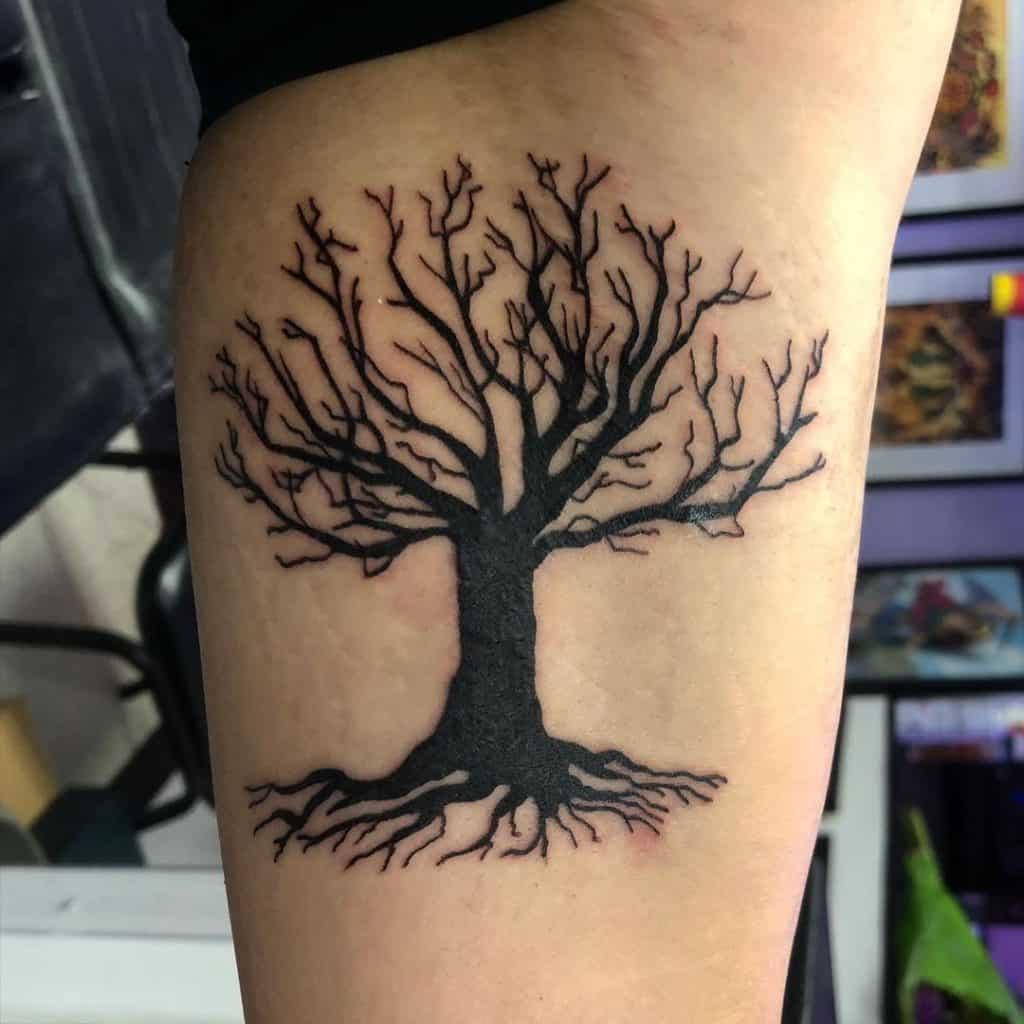 tree of life tattoo over scar