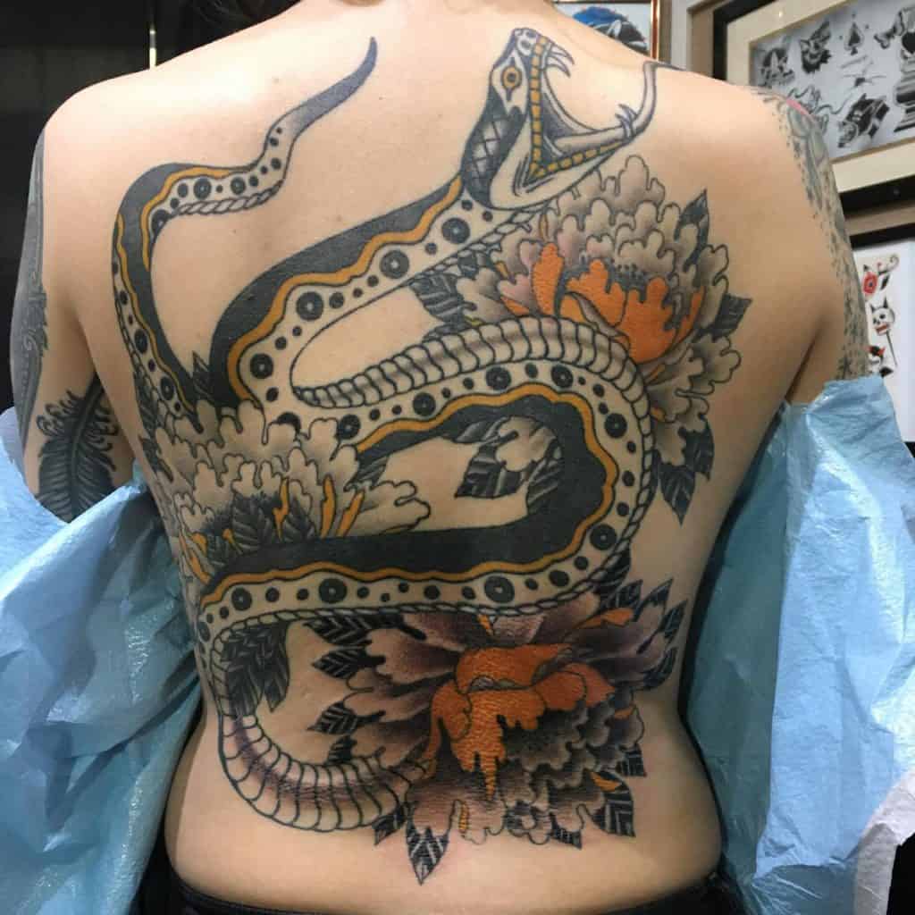 15 Tips for Tattoos That Look Better as You Age 21 Back tattoos that age well 4