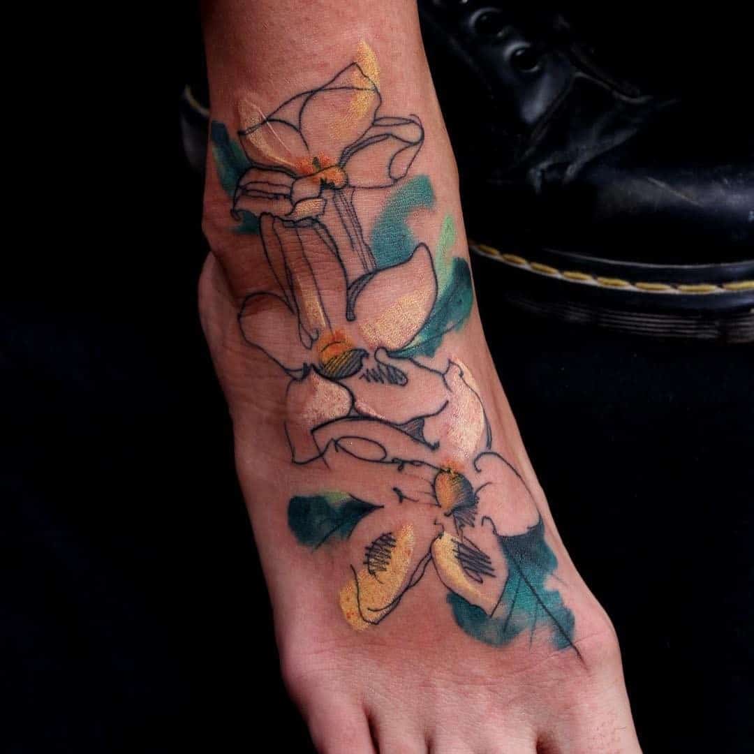 Blue Jasmine Flower Tattoo Over Foot 