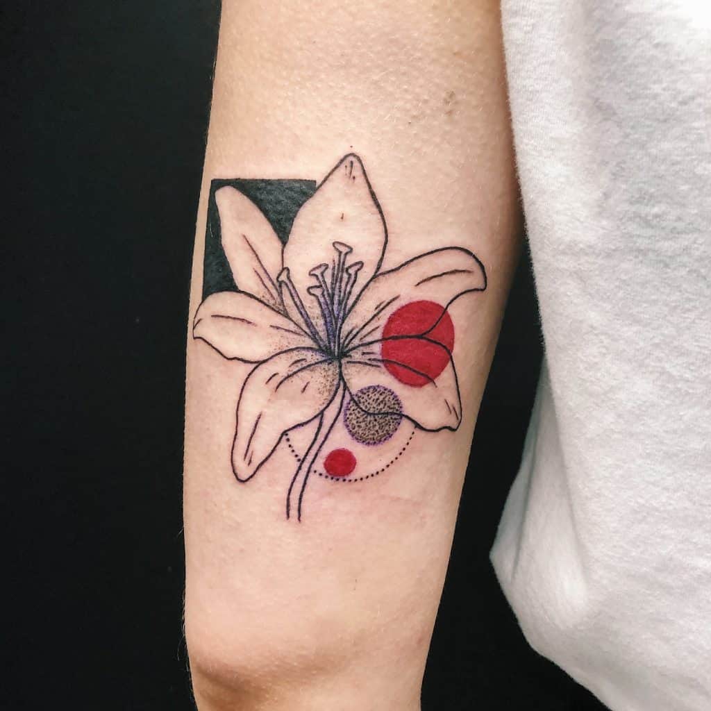 Delicate Black & Red Lily Tattoo