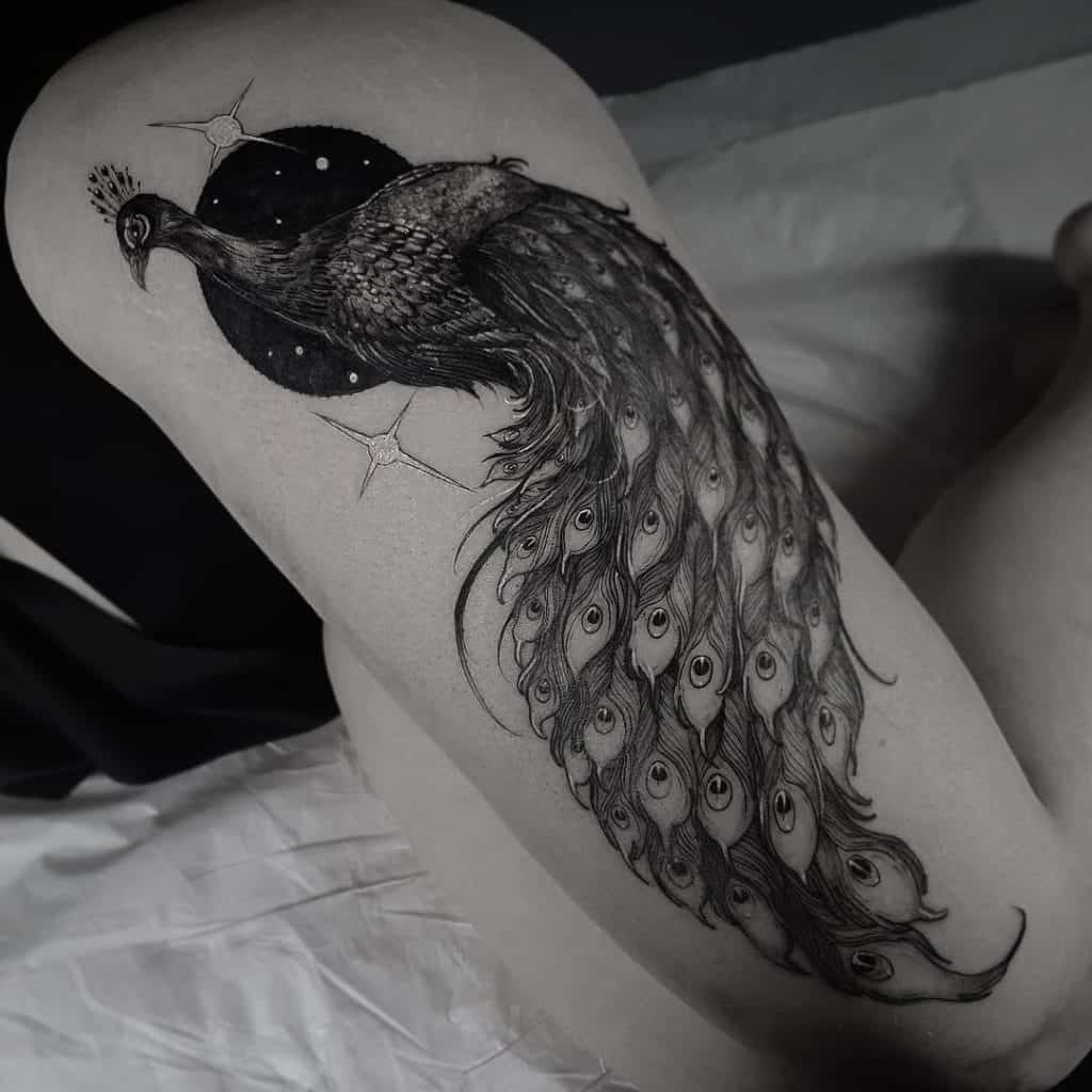 Giant Thigh & Black Peacock Tattoo 