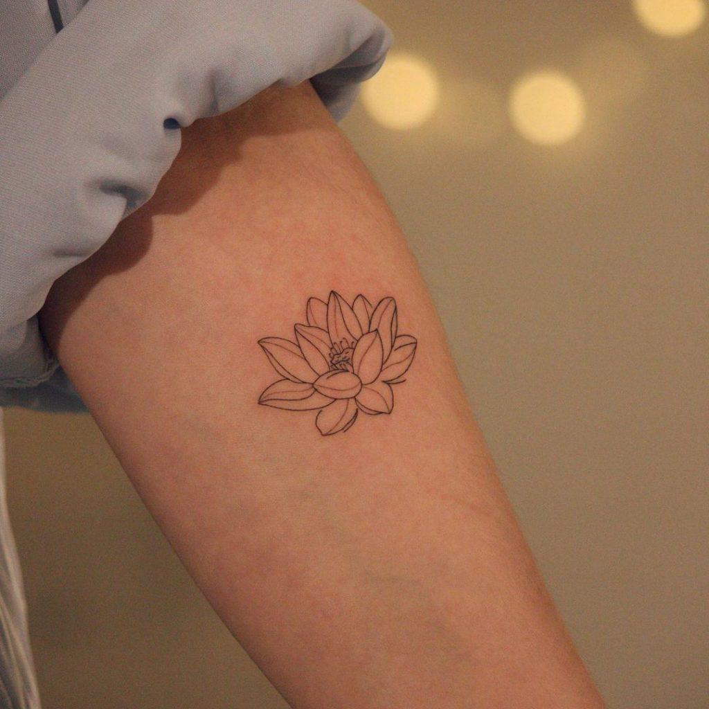 Lotus flower tattoo with big meanings 1