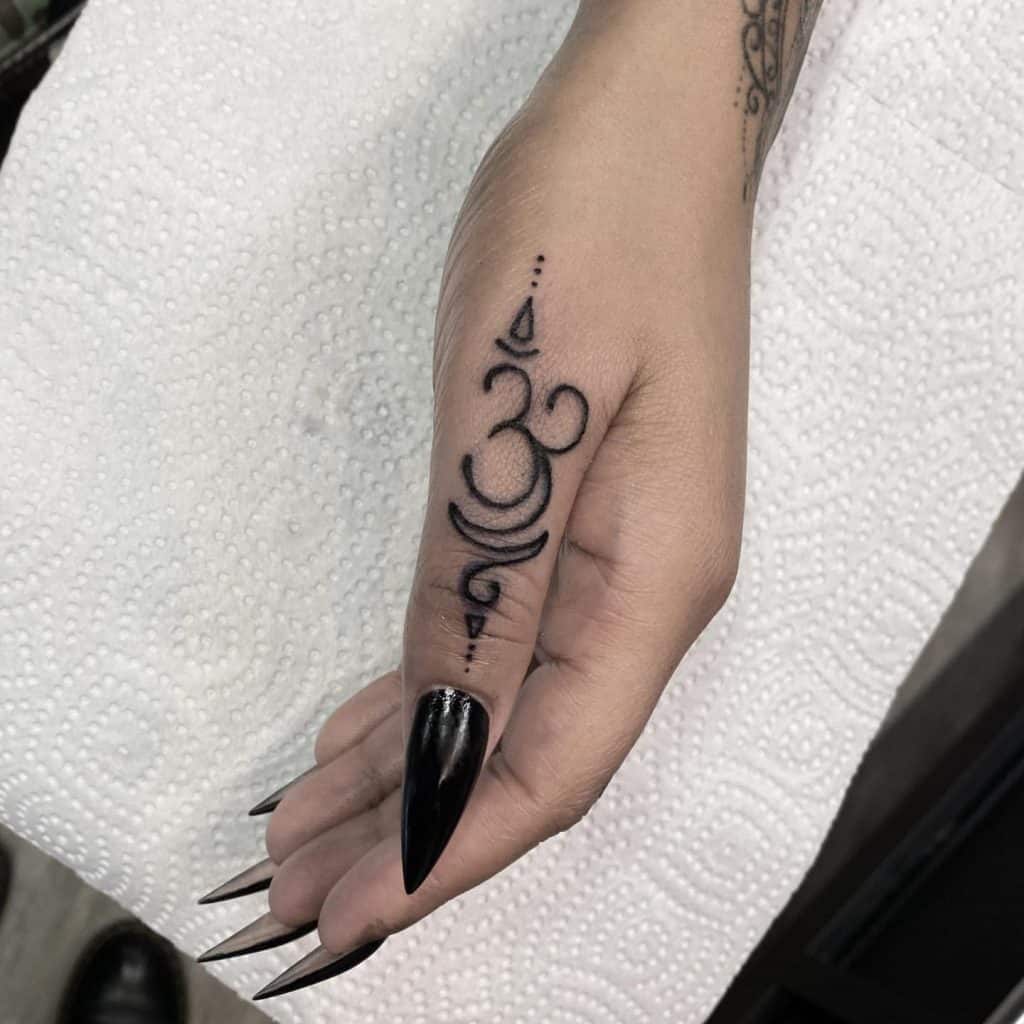 Ohm tattoo with big meanings 2
