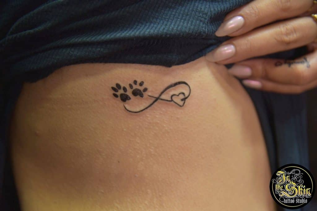 15 Tips for Tattoos That Look Better as You Age 30 Upper ribcage tattoo that age well 3