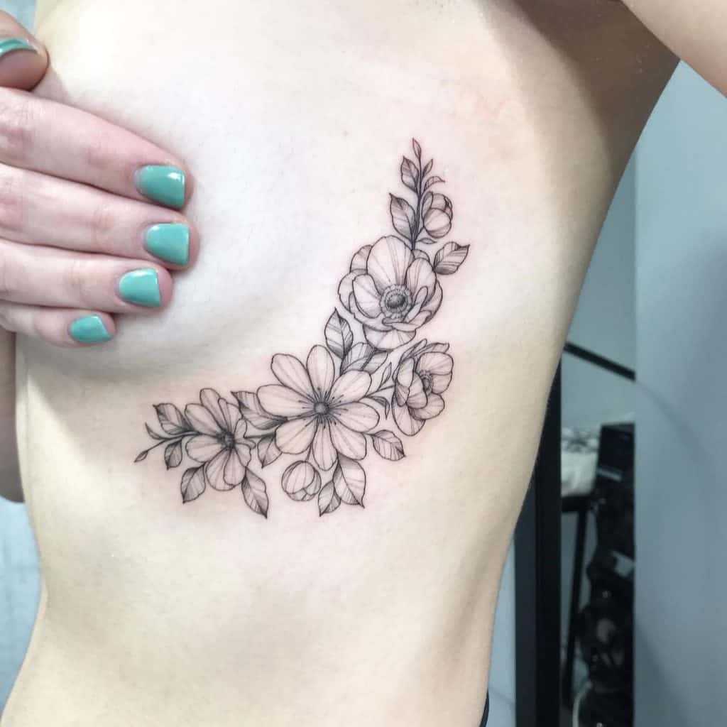 15 Tips for Tattoos That Look Better as You Age 31 Upper ribcage tattoo that age well 4