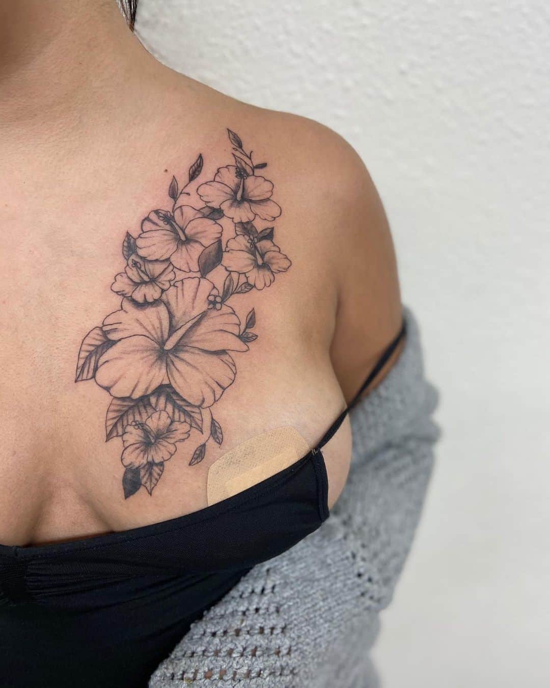 Black And White Hibiscus Flower Over Chest 