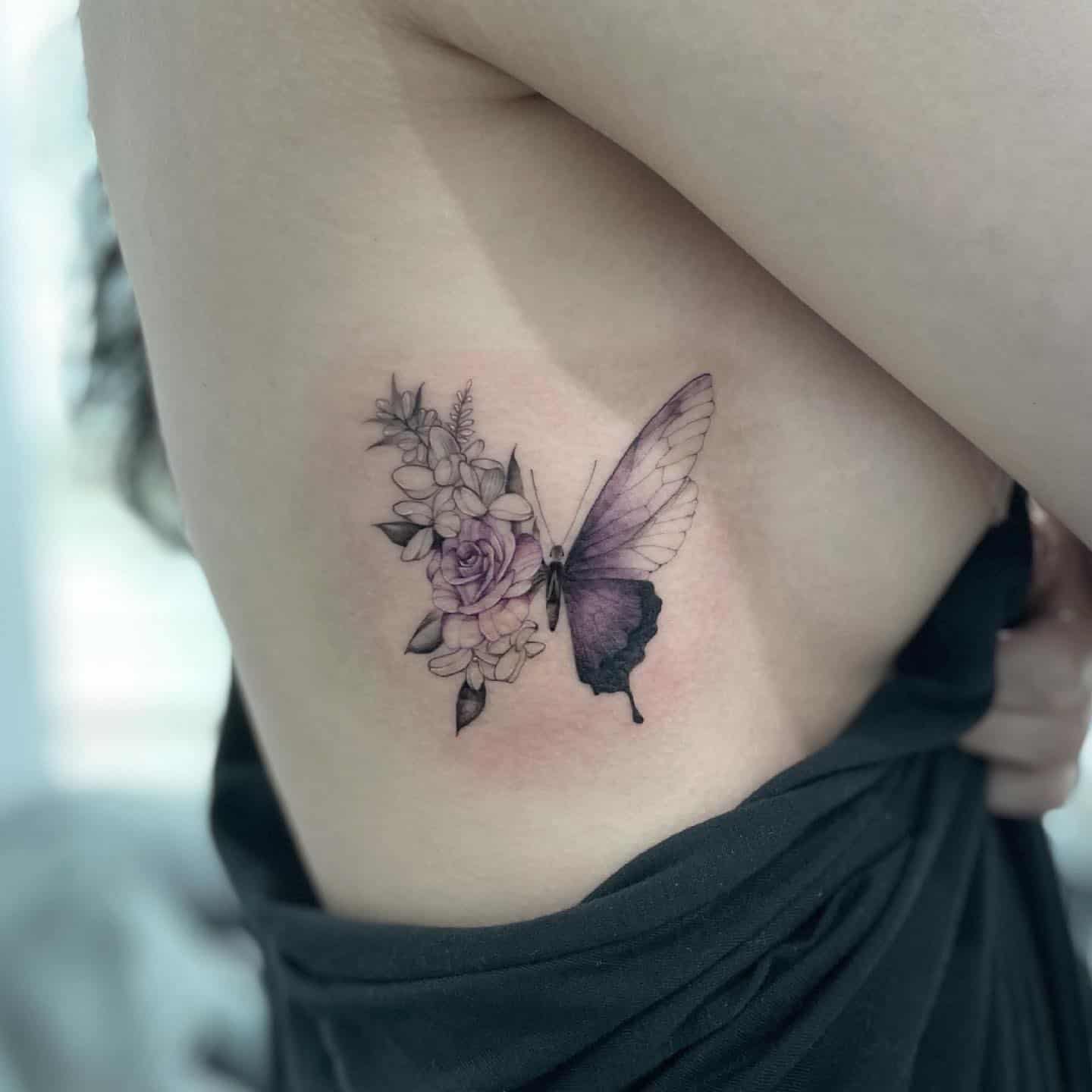 Butterfly side tattoo 5