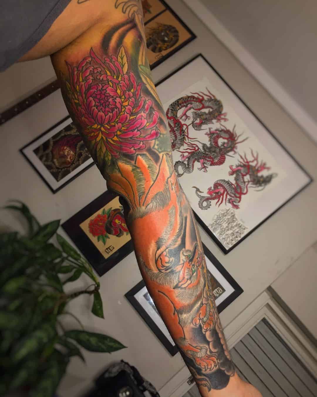 Japanese flower arm sleeve tattoo 1
