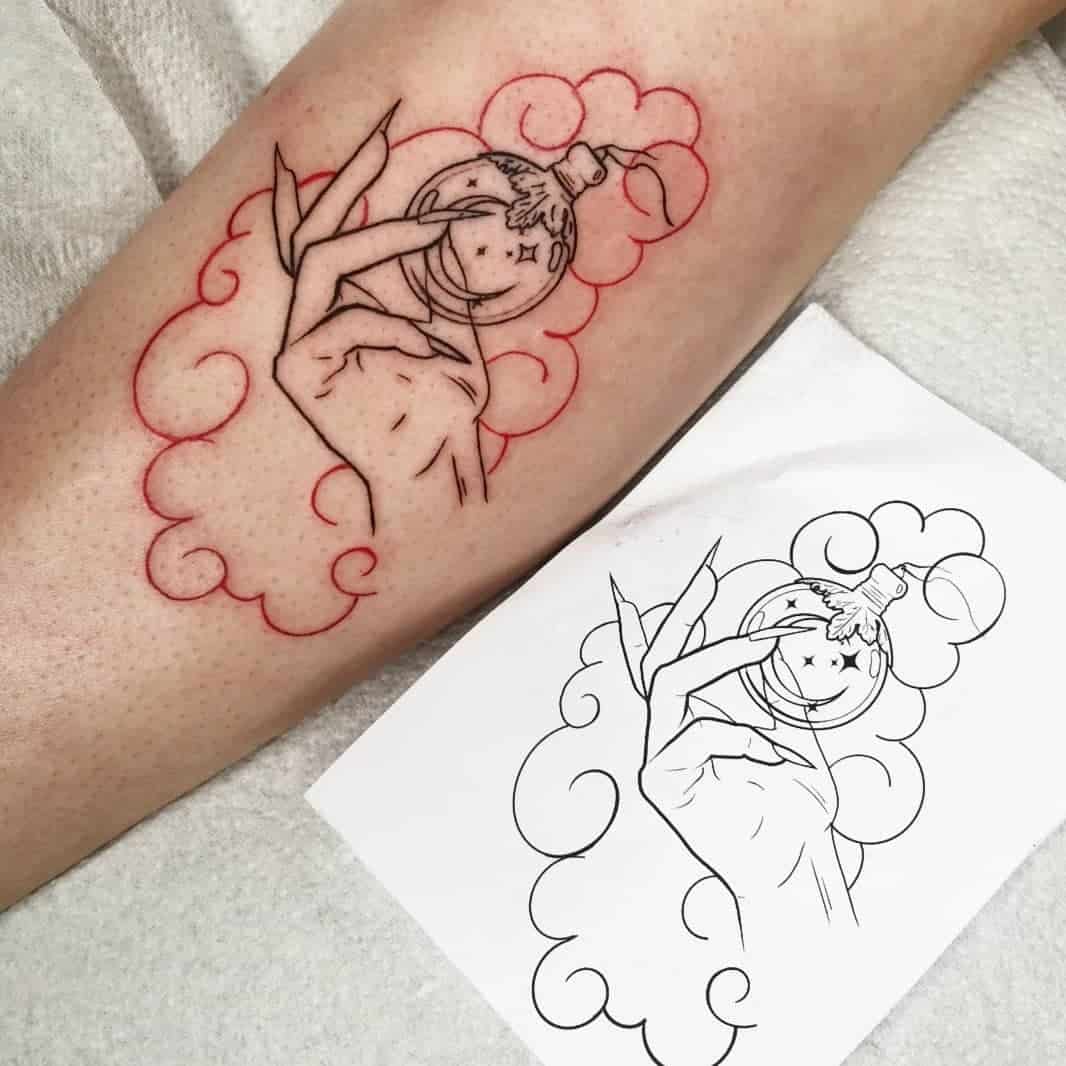 Small Calf Tattoo With Pop Of Red