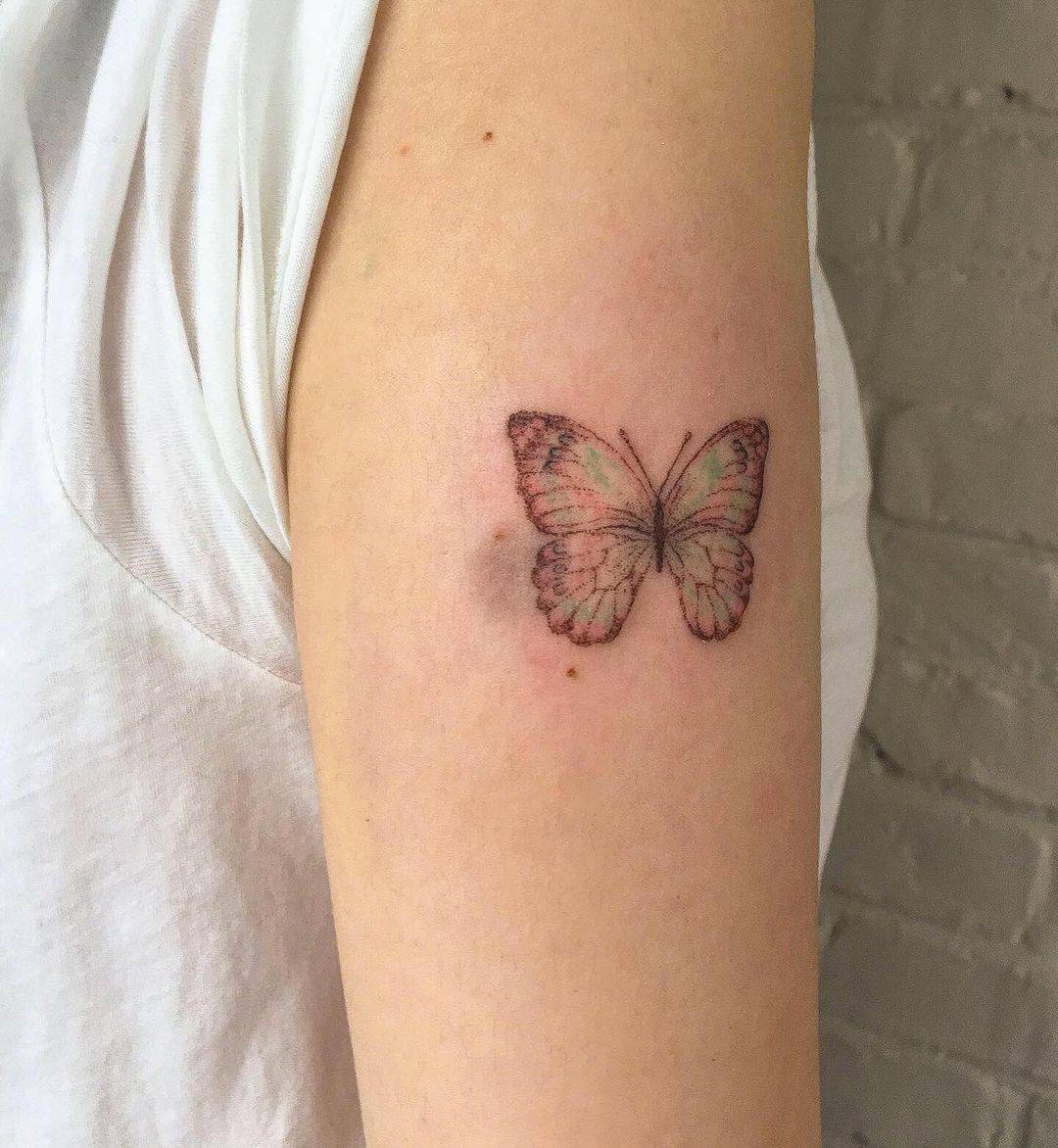 cover Birthmarks with a butterfly tattoo