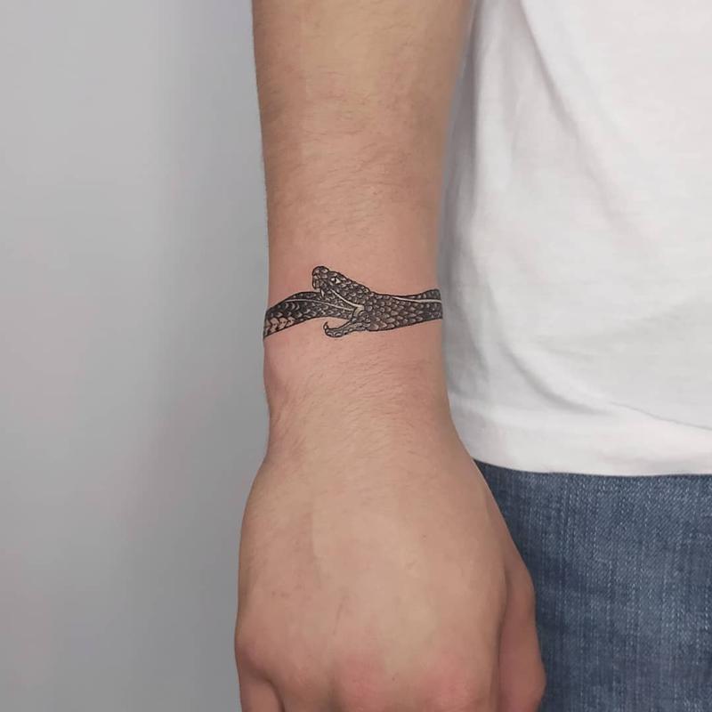 Wrist ouroboros tattoo 3