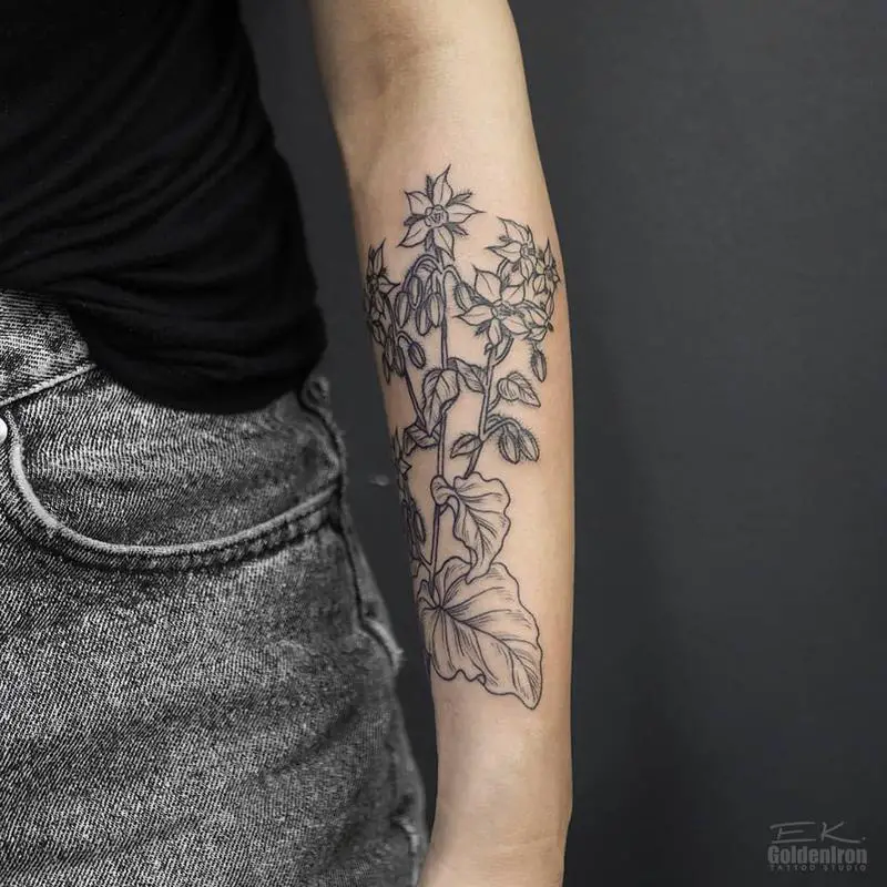 Flower and bird tattoo on the forearm - Tattoogrid.net