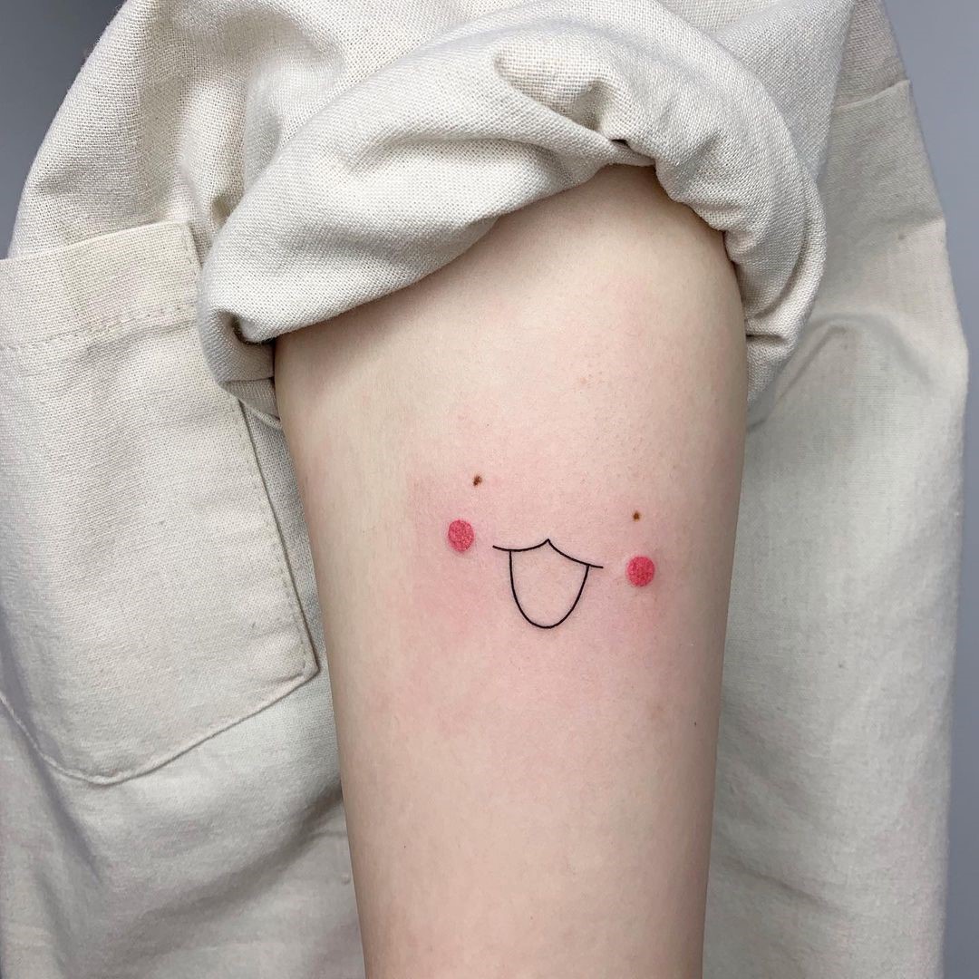 Smiley Face Tattoo On Shoulder