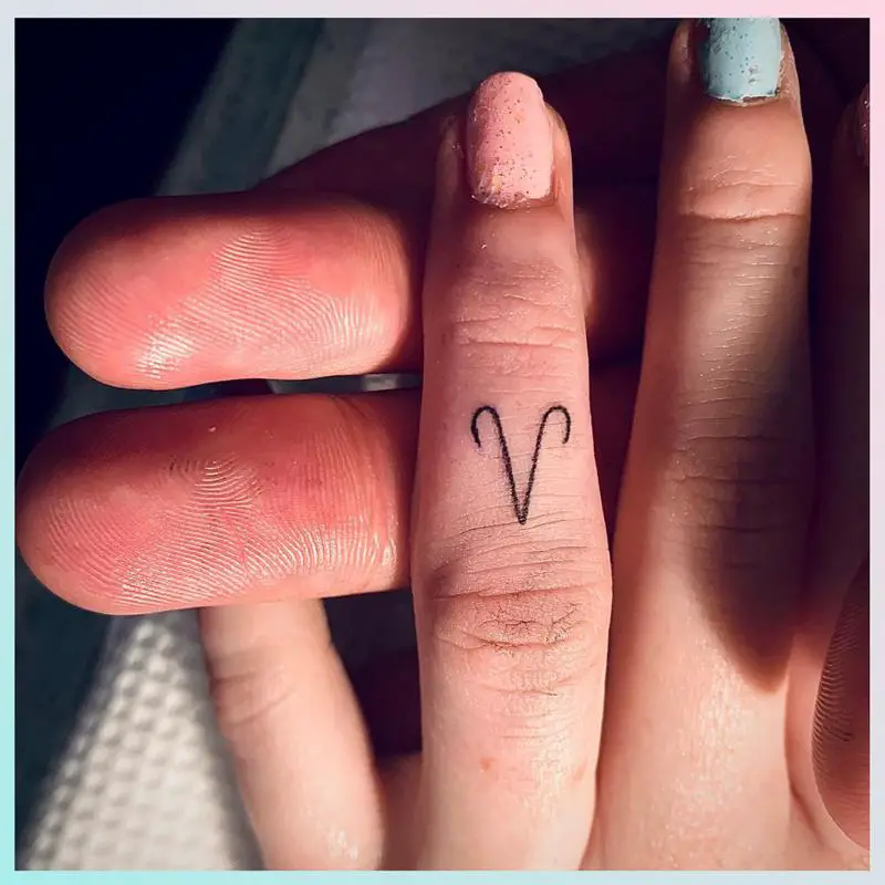 Aries finger tattoo