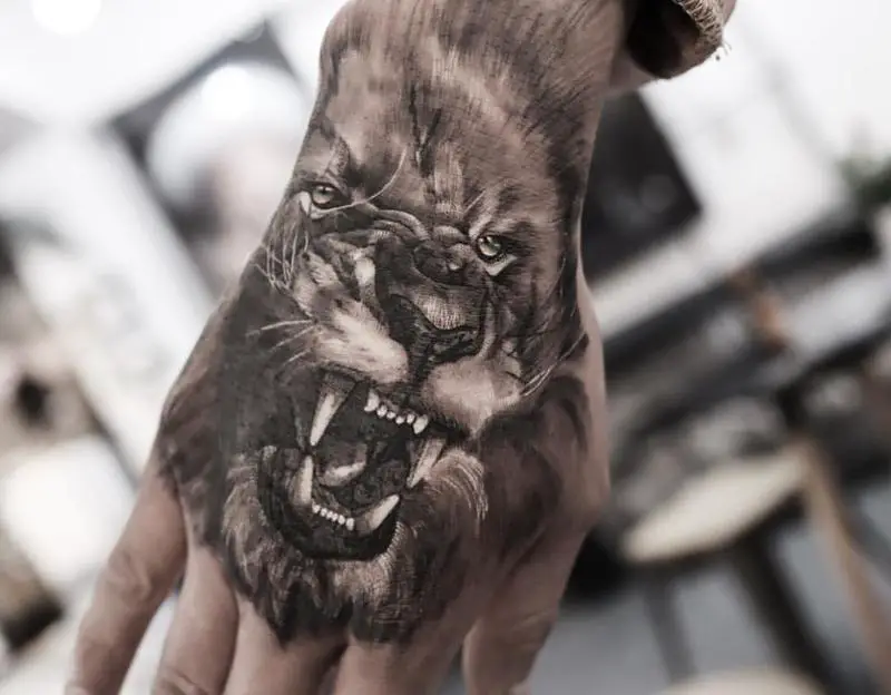 Blue Color Eyes Lion Tattoo 1