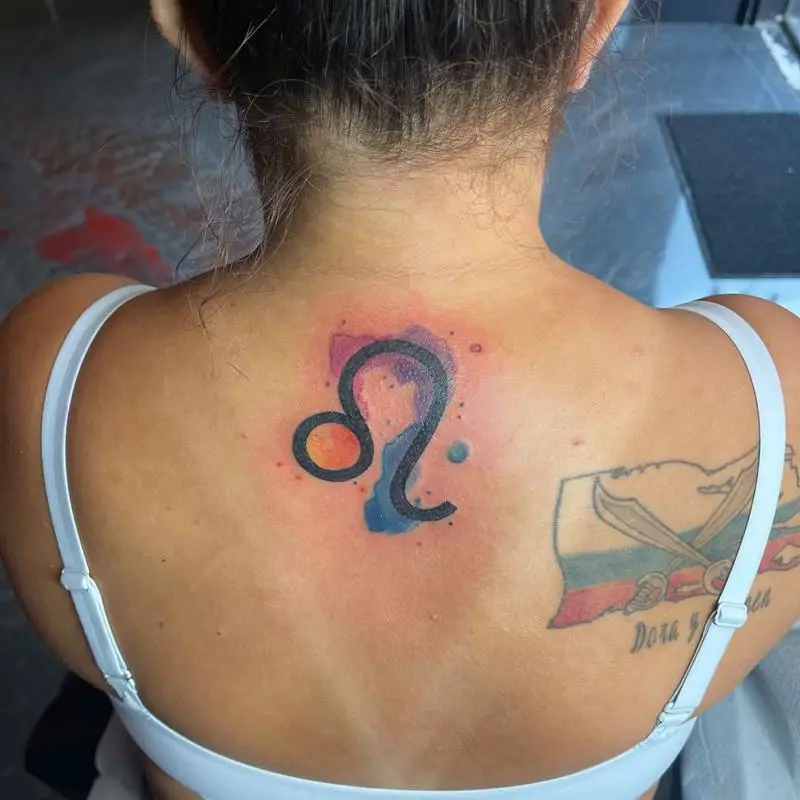 Colorful Zodiac Leo Sign Tattoo On The Back