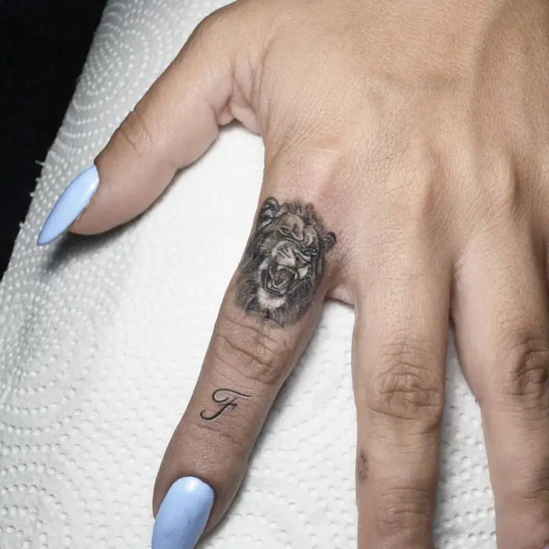 Lion Finger Tattoo 1