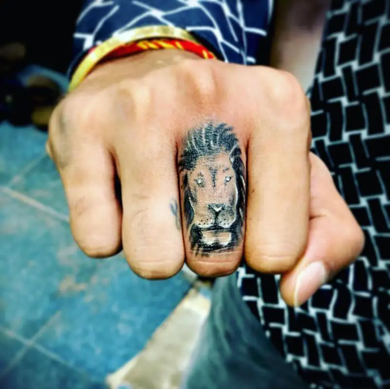 Lion Finger Tattoo 3